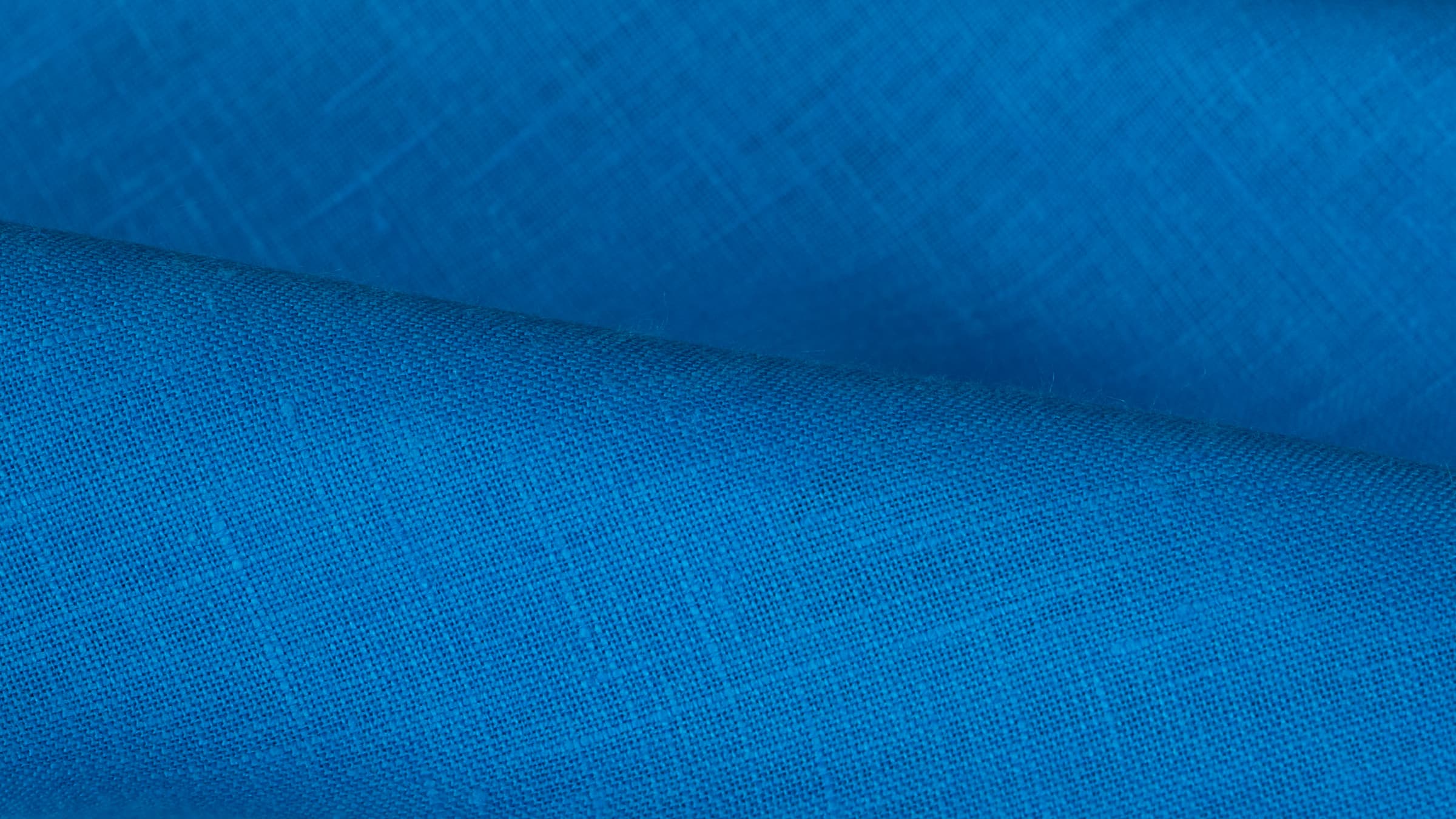 Linen drapery in soft morning light in a quiet living room